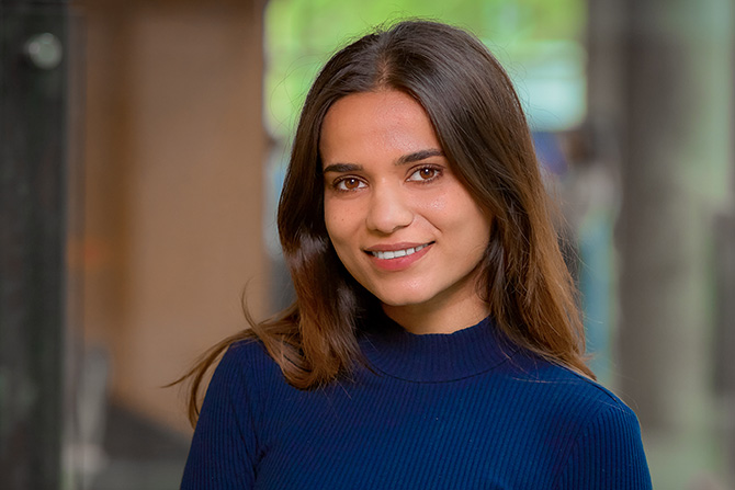 Ghodke Surbhi, woman with dark hair in blue sweater