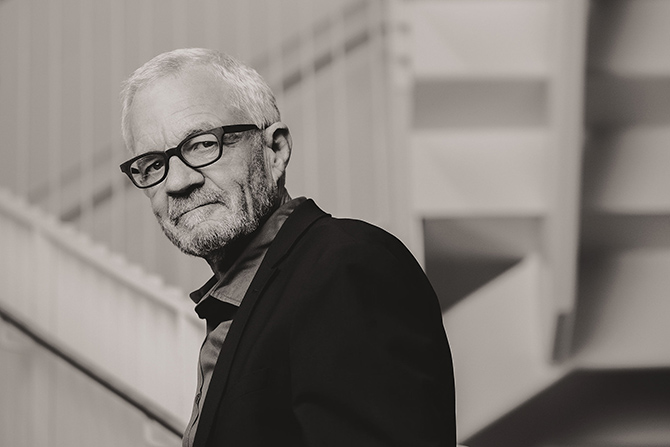 Prescott Muir, man in glasses and dark suit