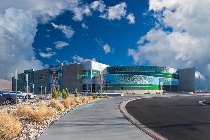 Modern school building under blue sky